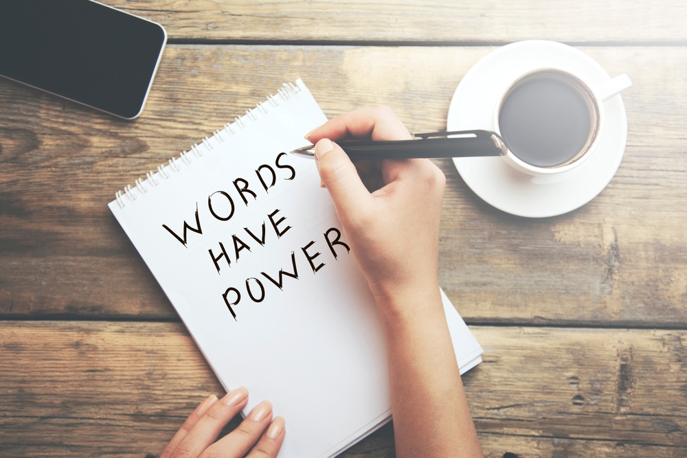Female,Hands,Notepad,With,Text,Words,Have,Power.,Business,And Female,Hands,Notepad,With,Text,Words,Have,Power.,Business,And